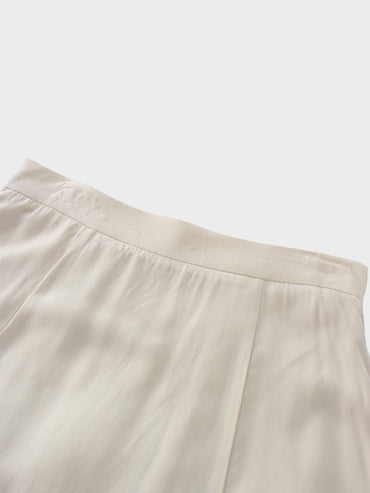 Beige long skirt on a white background