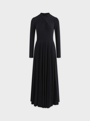 Black dress with long sleeves on a white background