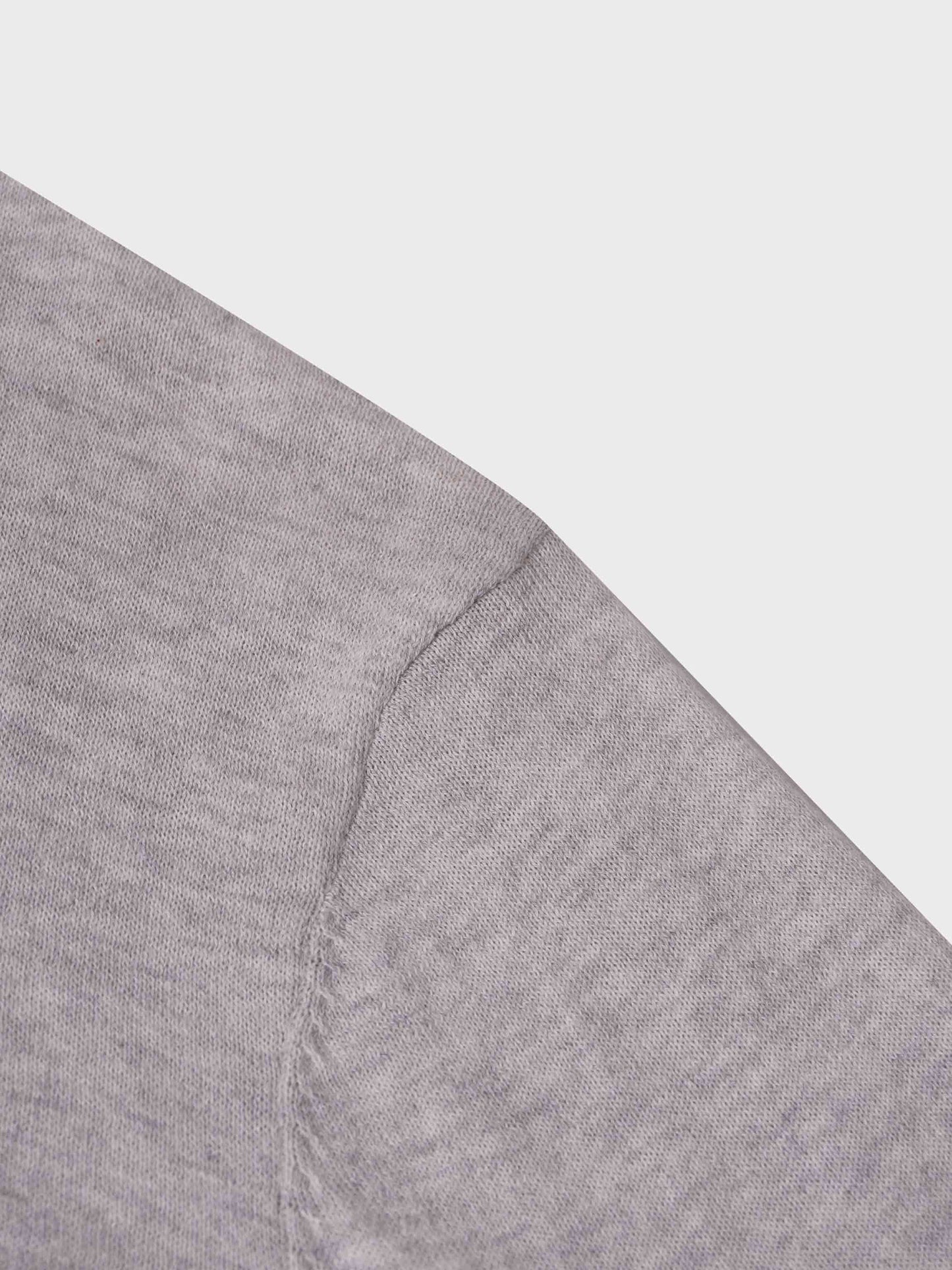 Close-up of a gray fabric texture on a white background