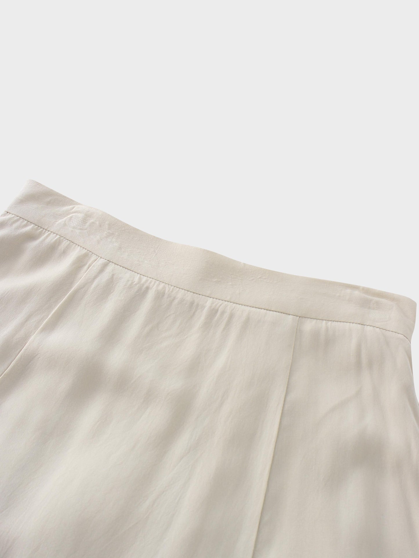 Beige long skirt on a white background