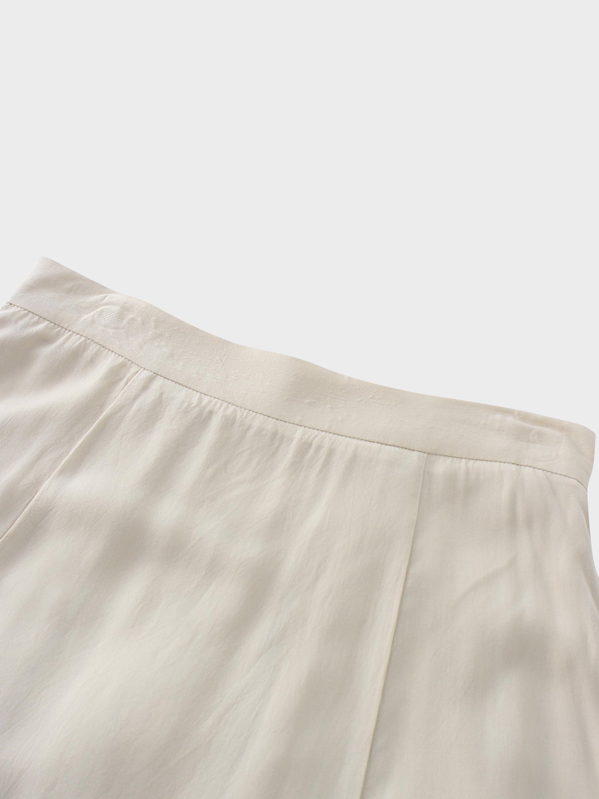 Beige long skirt on a white background