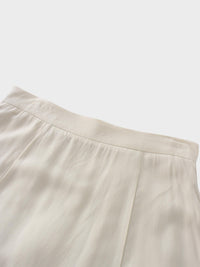 Beige long skirt on a white background