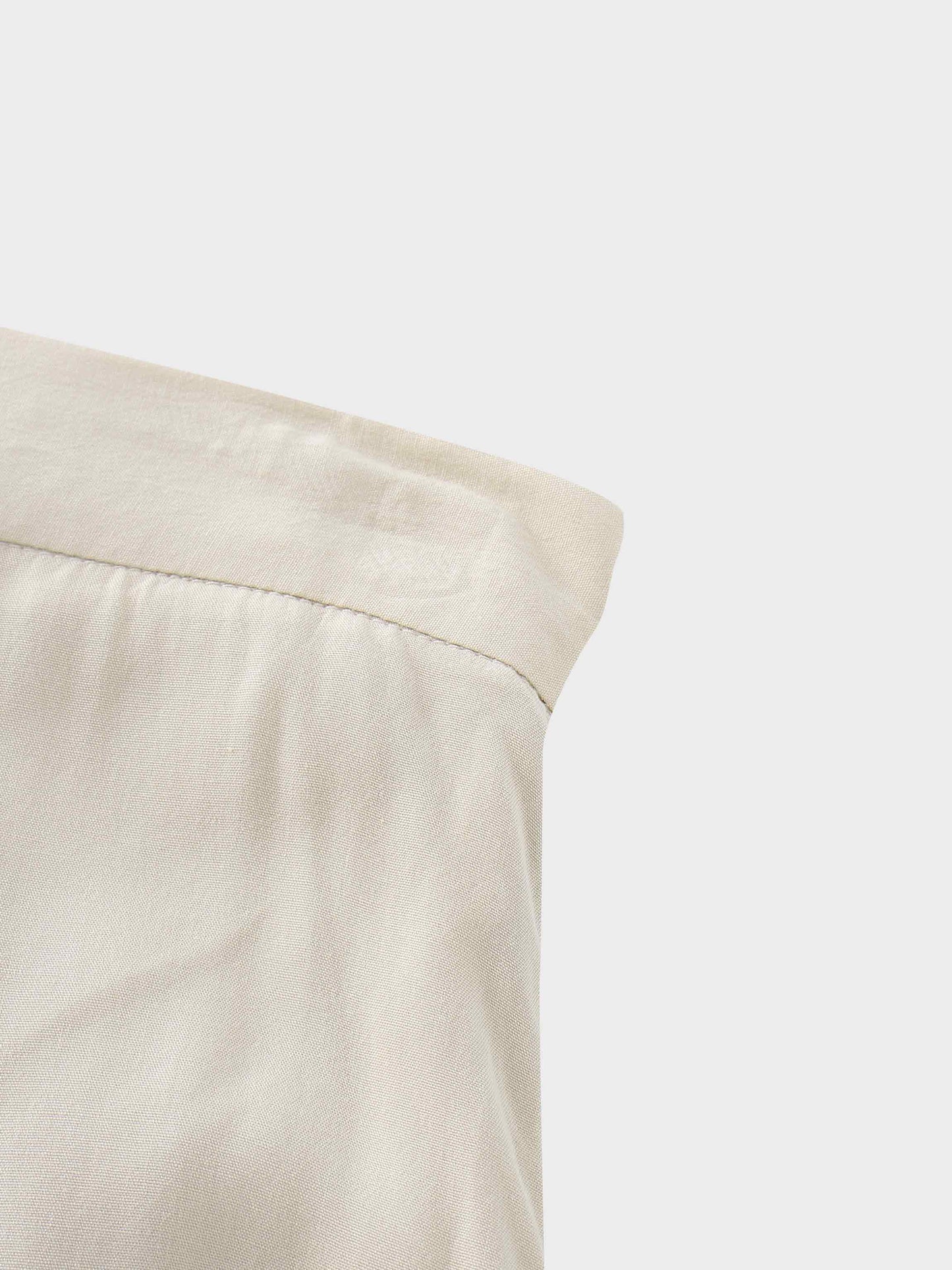 Beige long skirt on a white background