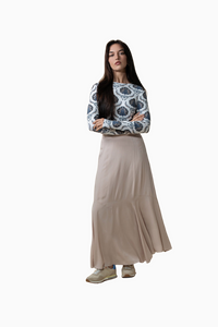 Beige long skirt on a white background