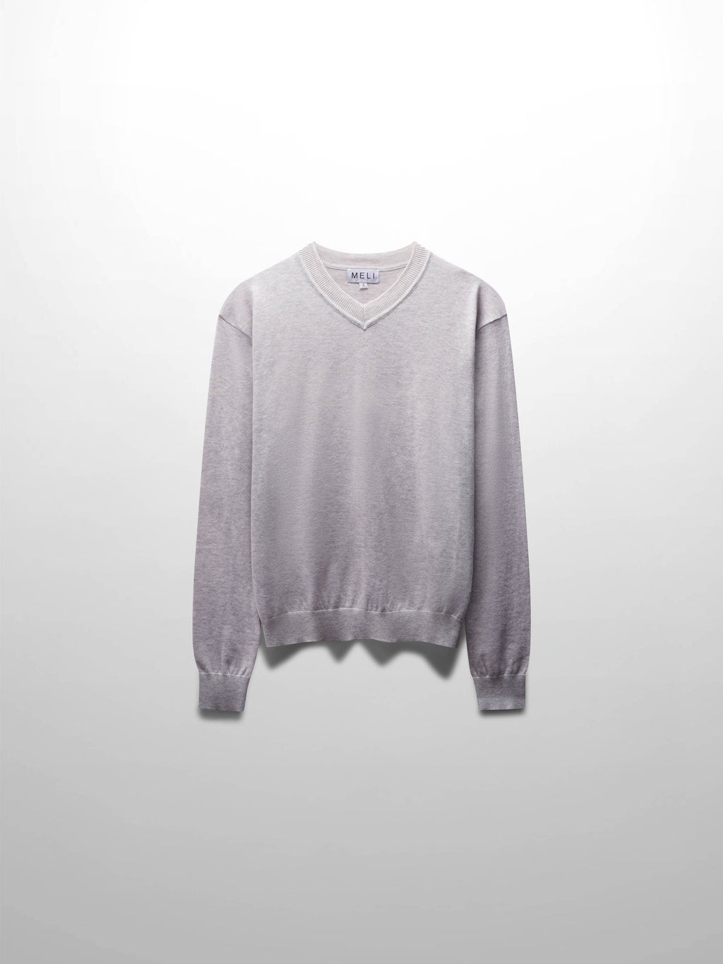 Gray sweater on a light gray background