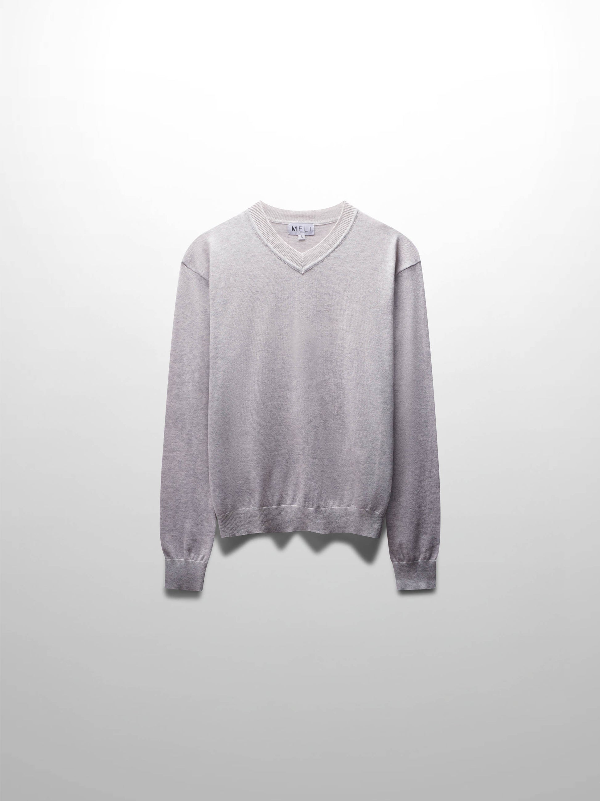 Gray sweater on a light gray background
