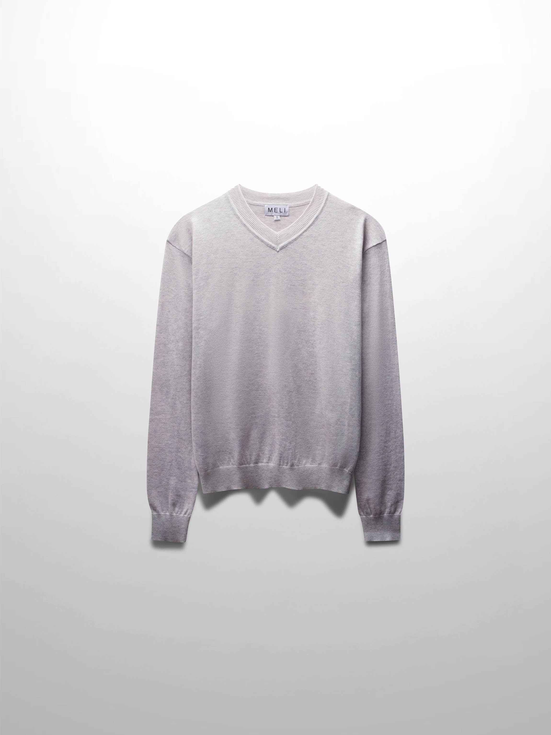 Gray sweater on a light gray background