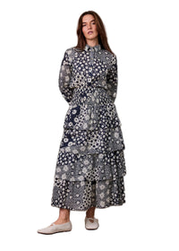 Woman wearing a floral dress on a white background