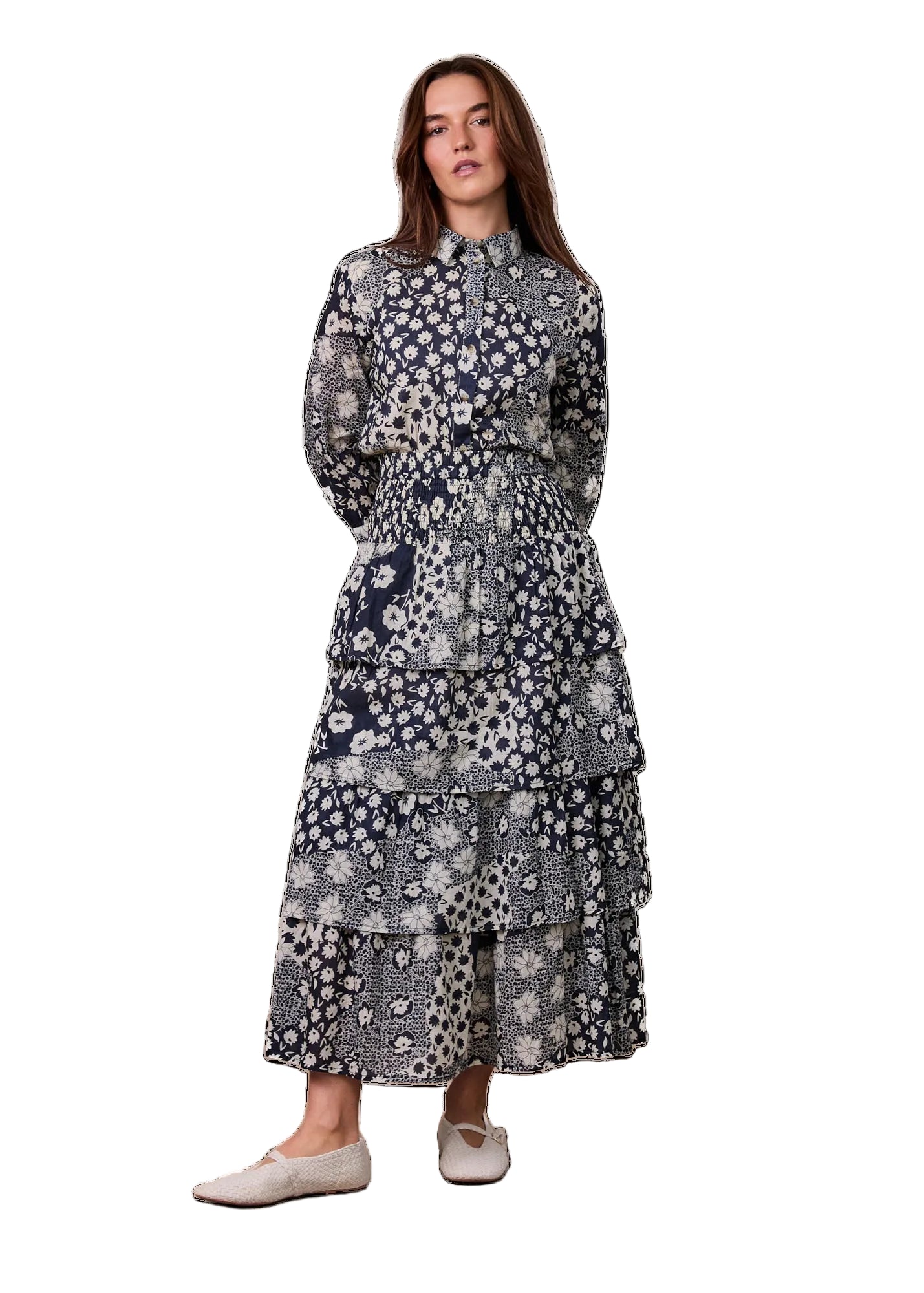Woman wearing a floral dress on a white background