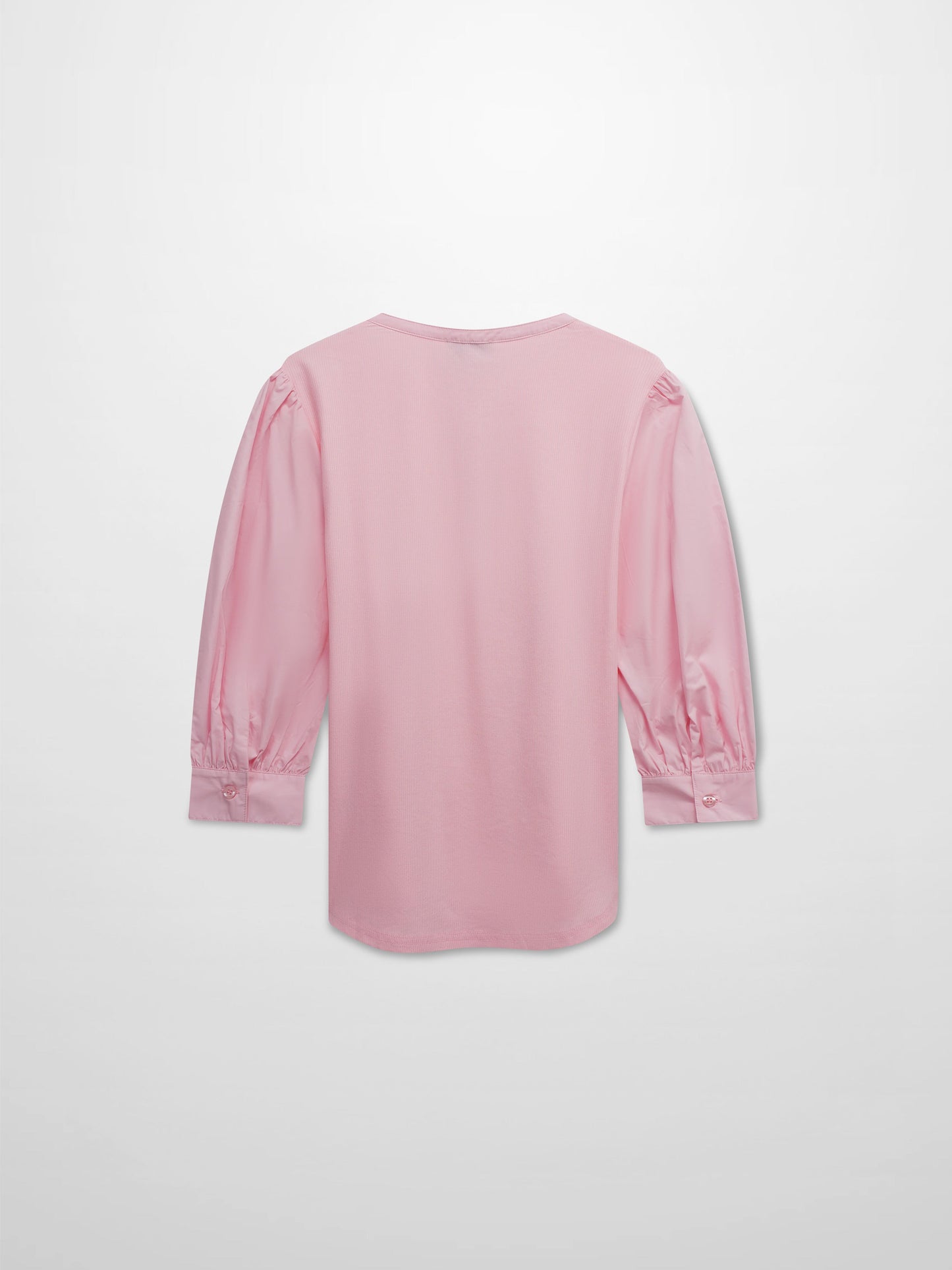 Pink long-sleeve top on a light gray background