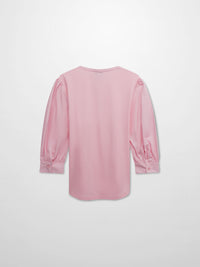 Pink long-sleeve top on a light gray background