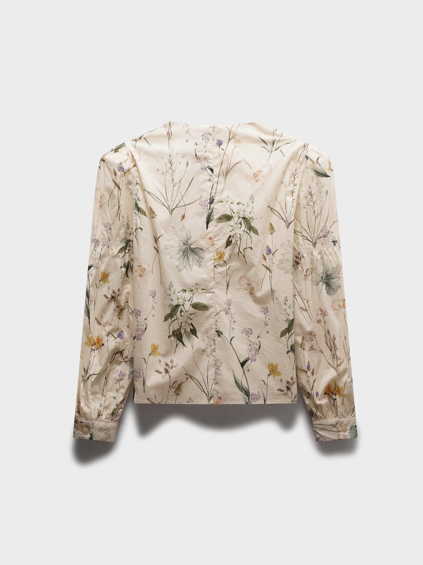 Floral-patterned jacket on a light gray background
