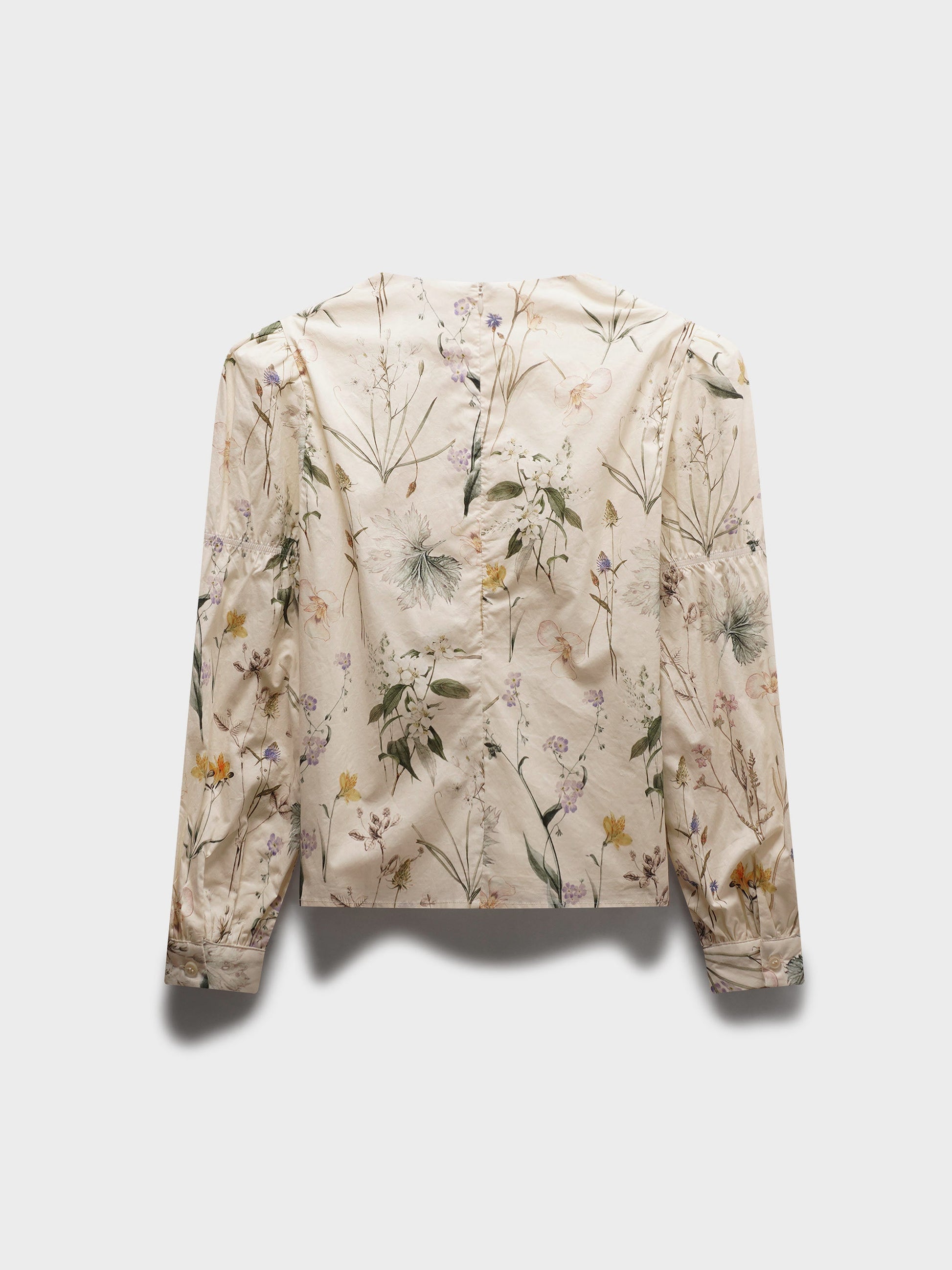 Floral-patterned jacket on a light gray background