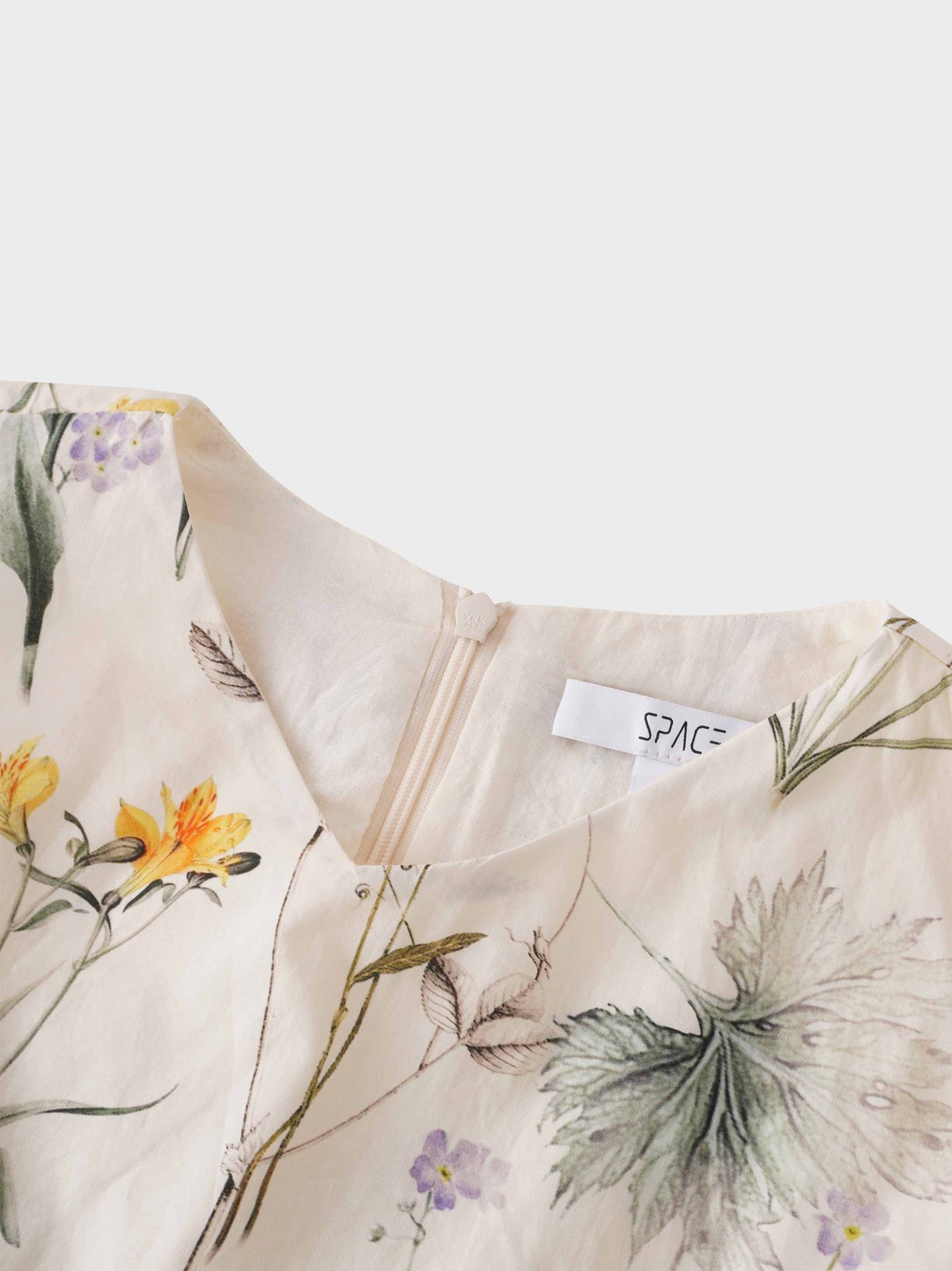 Floral patterned fabric with a 'SPACE' label on a white background